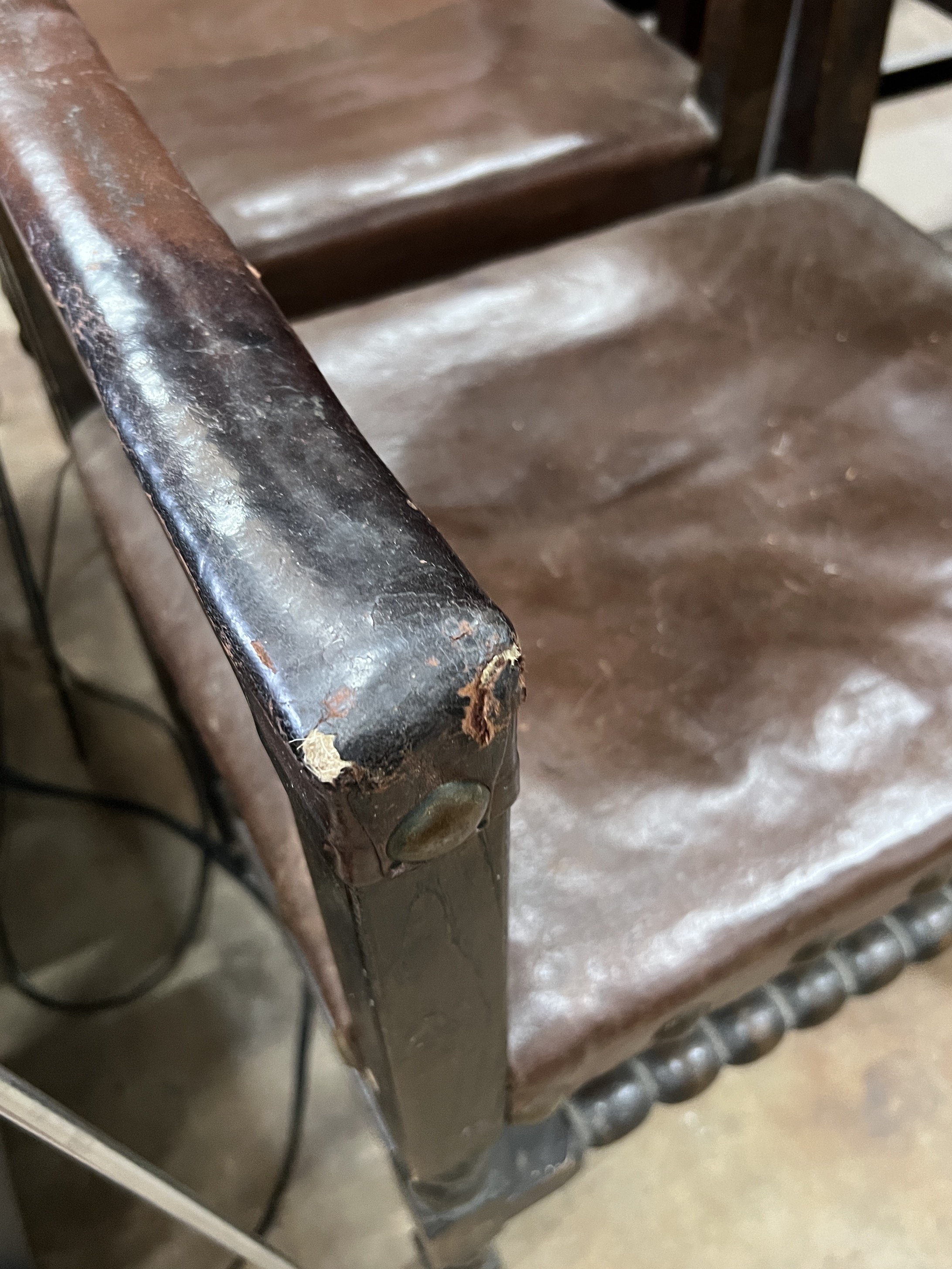 A set of eight 1920’s 17th century style oak dining chairs, the carvers with crested top rails